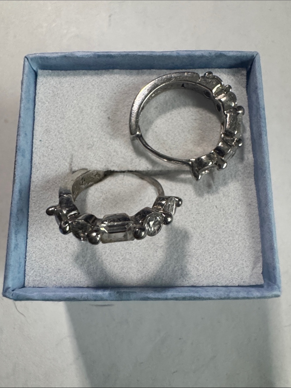 Stamped 925 earrings with cubic zirconia. Size comparison to dime in photo